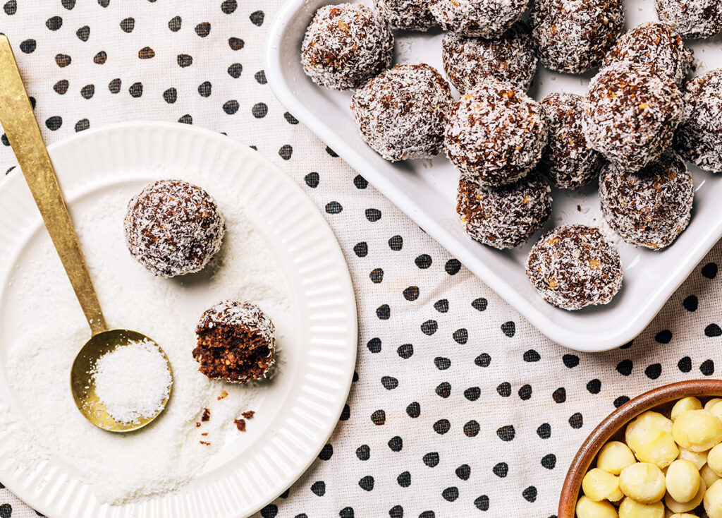 Overhead image of chocolate balls covered in coconut.