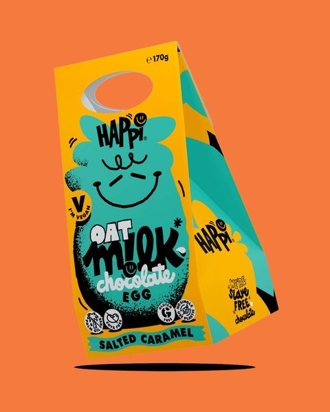 A stock image of the HAPPi Oat Milk Egg packaging on an orange background.