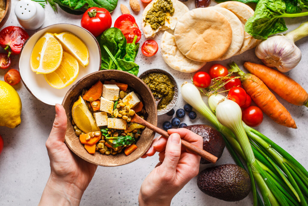 Vegetables, hummus, pesto and lentil curry with tofu.