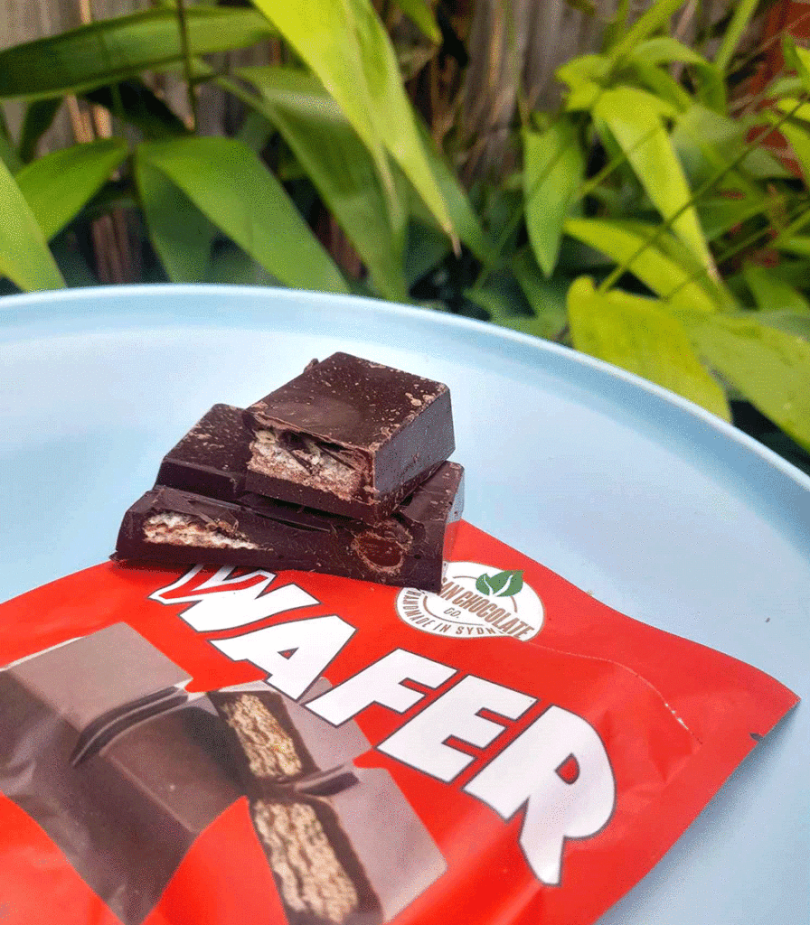 A V Wafer bar has been cut to show the chocolate and wafer layers.