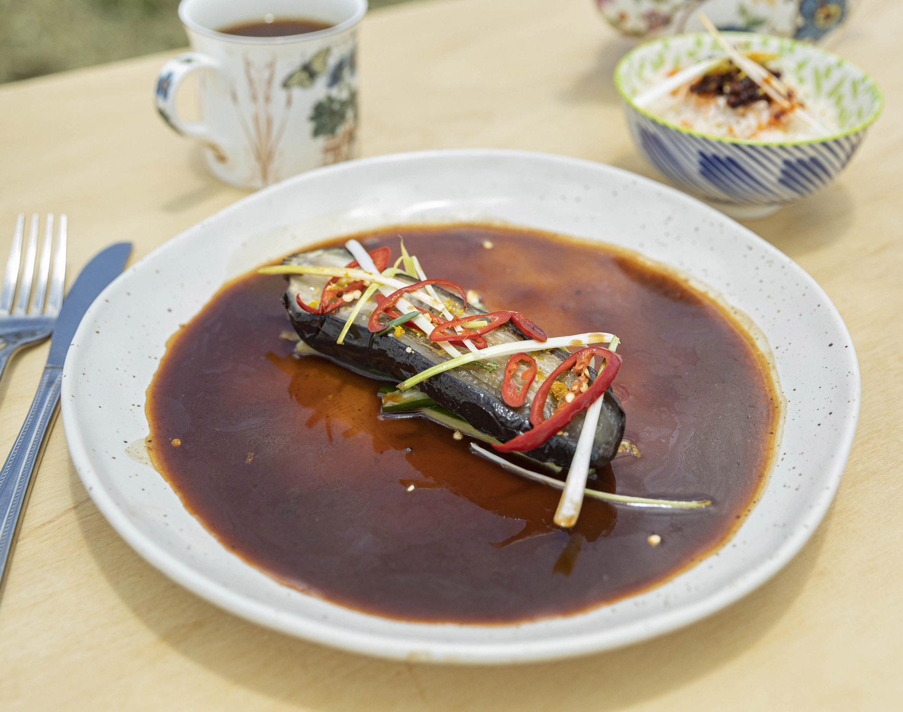 Braised Eggplant with dark stock in a plate