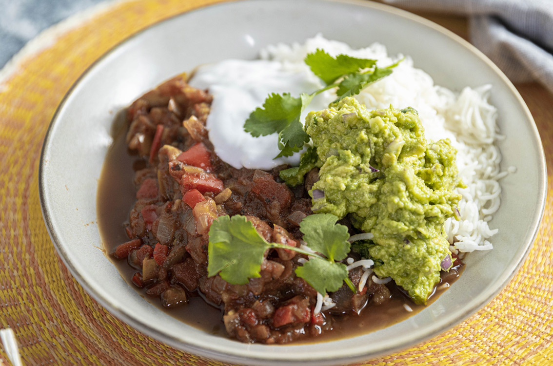 smoked chilli in a bowl with smashed avocado