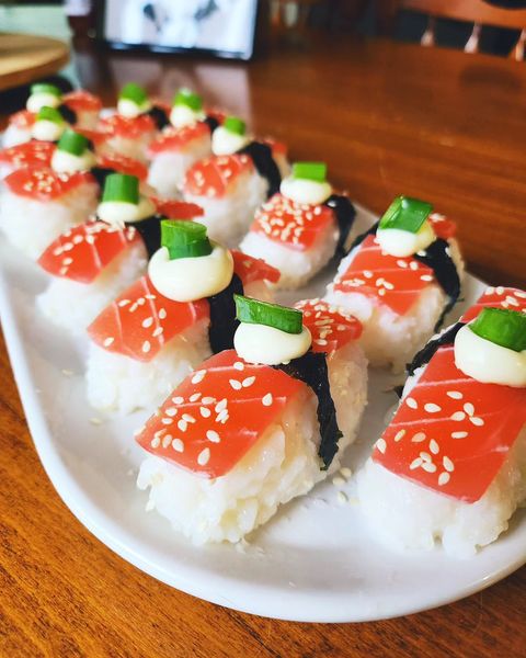 A serving platter full of tuna-free nigiri using Vish vegan sashimi.