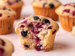 The cross section of a mixed berry muffin.